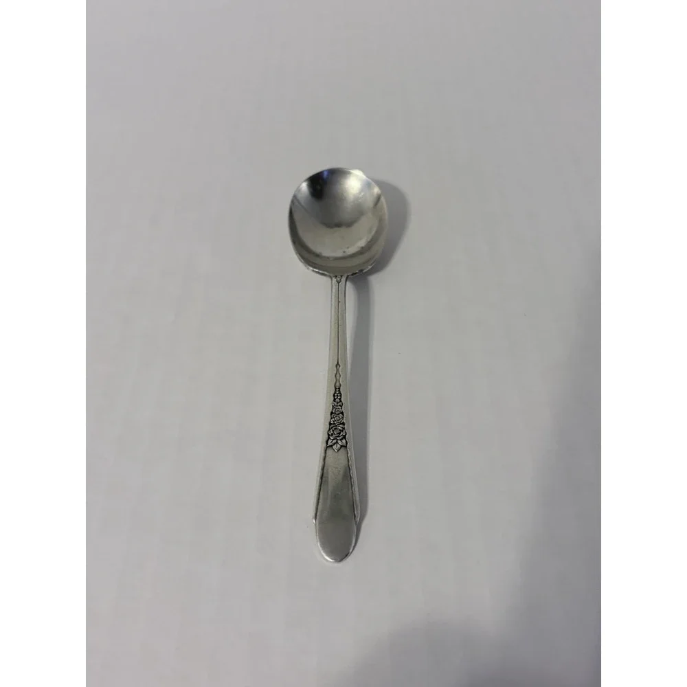 Wm. A Rogers Silver Plated Spoon Floral Decorative Handle Glossy Silver 6 in